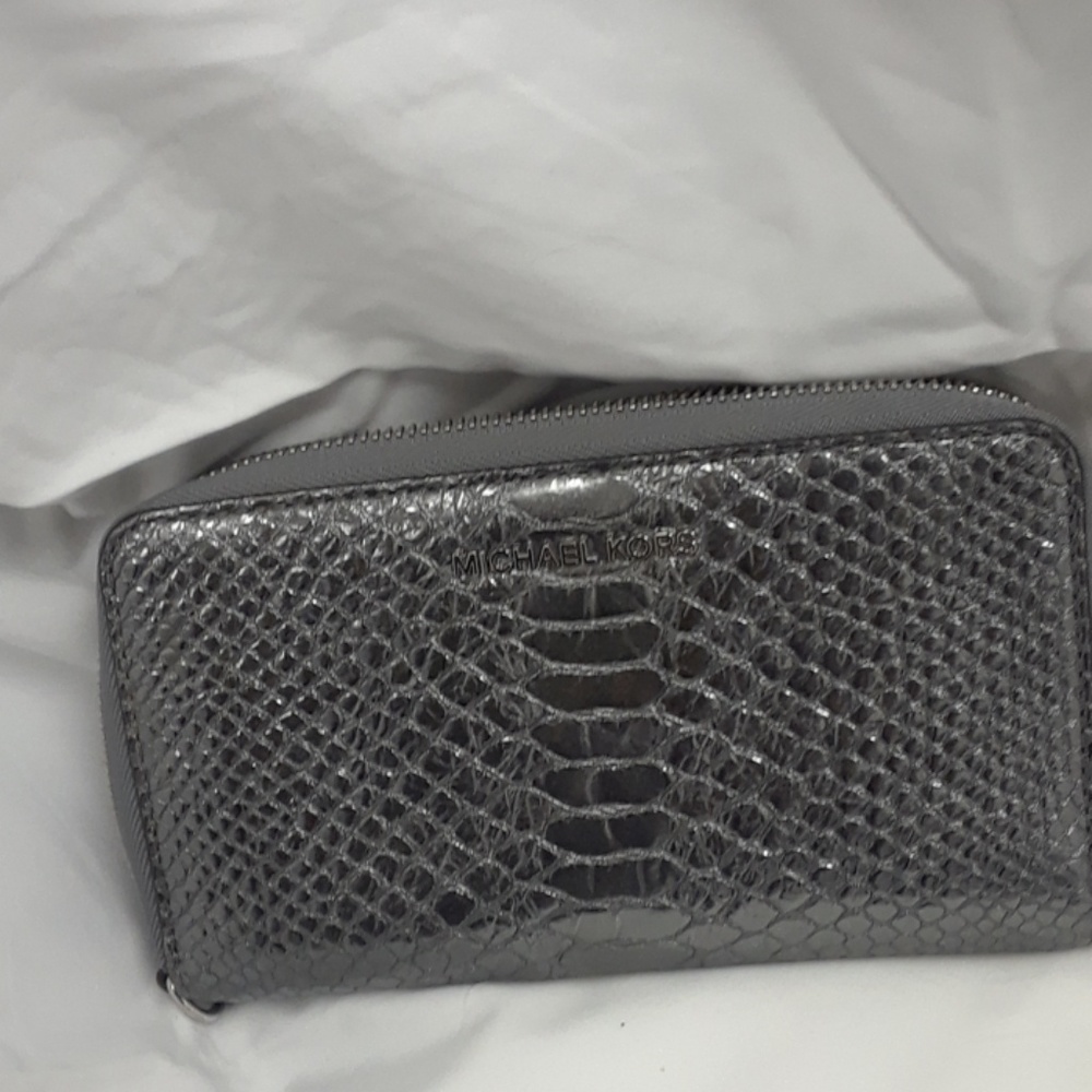 Michael Kors multifunction wristlet GET IT FREE!